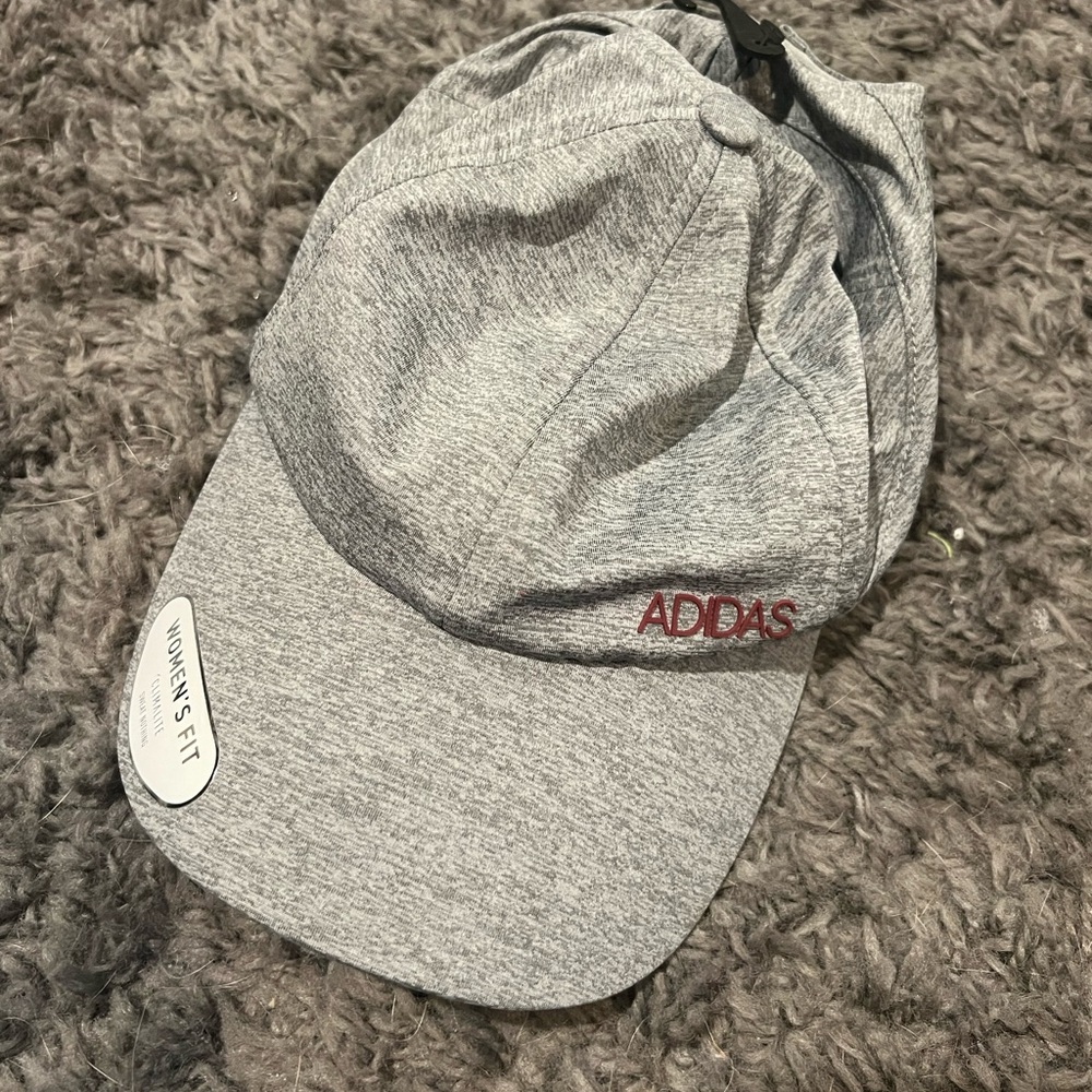 Never worn Women’s fit adidas running hat